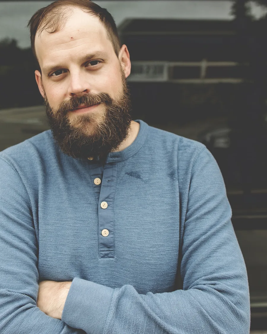 Portrait of Tanner Budde, founder of SBJ Consulting